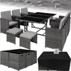 A rattan garden furniture set including chairs, a table, and ottomans, with a protective cover shown separately. Náhled obrázku produktu