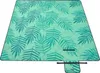 A picnic blanket with a tropical fern pattern is laid out flat on a white background. Produktbild-Vorschau