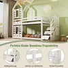 A white wooden bunk bed with a house-shaped frame, set up in a child's bedroom with decorative clouds on the wall. Voir les images du produit