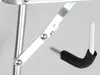 A close-up view of a metal folding table hinge mechanism with a black rubber grip. Anteprima dell’immagine prodotto