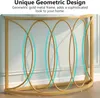 A close-up of a gold metal console table with a geometric design. Podgląd zdjęcia produktu