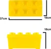 Two views of a yellow LEGO storage box with dimensions indicated. Podgląd zdjęcia produktu