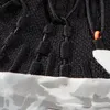 Detailansicht des Obermaterials der Damen-Zustiegsschuhe "Hueco Knit II Low" von Mammut; mit schwarzem Strickdesign und grauem Sohlenmuster. Produktbild-Vorschau