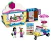 A LEGO Friends Olivia's Cupcake Cafe playset with figures, a food truck, and various accessories. Náhled obrázku produktu