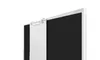 A close-up, angled view of a flipchart paper holder attached to a black flipchart board. Produktbild-Vorschau