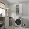 A laundry room with a washing machine, cabinets, and laundry supplies. Produktbild-Vorschau