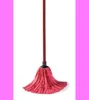 A red mop with a dark handle is shown against a white background with pink borders. Náhled obrázku produktu