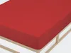 A red fitted sheet on a bed frame. Produktbild-Vorschau