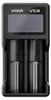 A black battery charger with a screen and two battery slots. Anteprima dell’immagine prodotto