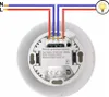 The back of a white human presence sensor with wires connected to terminals, showing wiring instructions. Produktbild-Vorschau