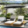 A patio scene with lounge chairs and a large umbrella by a pool. Náhled obrázku produktu