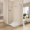 A modern bathroom with a glass shower enclosure, a freestanding bathtub, and a large window overlooking a city skyline. Náhľad obrázku produktu