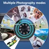 A collage of images showcasing different photography modes and features of a digital camera, with a central dial displaying icons for various modes. Produktbild-Vorschau