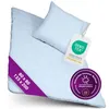 A light blue seersucker bed set, consisting of a duvet and pillow, is displayed on a white background. It features various certification tags and labels. Produktbild-Vorschau