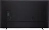 The back of a black television set with its stand. Produktbild-Vorschau