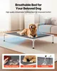 A golden retriever dog is resting on a raised dog bed in a living room setting. The image is divided into three sections at the bottom, showcasing features like easy fur cleaning, scratch-proof material, and washability. Produktbild-Vorschau