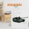 A toy tank is placed in a child's room setting, with a desk and shelves visible. Anteprima dell’immagine prodotto