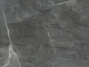 A close-up view of a dark gray marble-like surface with white veining. Produktbild-Vorschau