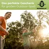 A father and son are outdoors, with the son aiming a bow and arrow. Náhled obrázku produktu