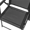 Close-up of the seat of a black folding chair. Produktbild-Vorschau