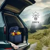 A blue cooler filled with food and drinks is placed in the open trunk of a dark green SUV, with a scenic mountain landscape in the background. Náhled obrázku produktu