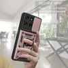 A hand holding a rose gold phone case with a ring holder and camera cover, in a bright, modern interior. Produktbild-Vorschau