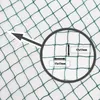 A close-up view of a green net with a magnifying glass showing the mesh size. Podgląd zdjęcia produktu
