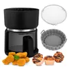 A product shot of an air fryer and its accessories, along with food items. Produktbild-Vorschau