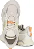A pair of white and cream colored Lacoste sneakers. Produktbild-Vorschau