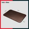 A brown rectangular metal plate with rounded corners, shown from a diagonal angle. Dimensions are indicated with arrows and text. Produktbild-Vorschau