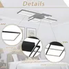 A modern geometric LED ceiling light fixture shown installed on a ceiling above a bed, with close-up insets highlighting product details. Voir les images du produit