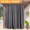 Outdoor curtains hanging from a pergola, with a pool and plants in the background. Produktbild-Vorschau