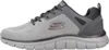 A side view of a gray and white Skechers athletic shoe. Anteprima dell’immagine prodotto