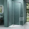 A modern bathroom with a glass shower enclosure and a view of a garden through a window. Produktbild-Vorschau