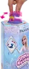 A hand is shown spinning a purple toy mechanism on top of a colorful product box. The box features characters and text related to Disney's Frozen. Náhľad obrázku produktu