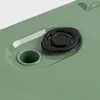 A close-up view of a green planter with a black plug and instructions for drilling a hole for water removal. Produktbild-Vorschau