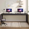 A home office setup with a long desk, two monitors, and a chair. Produktbild-Vorschau