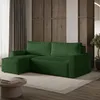 A green sectional sofa in a living room setting with a coffee table and rug. Produktbild-Vorschau