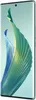 A smartphone with a colorful abstract wallpaper displayed on its screen. Podgląd zdjęcia produktu