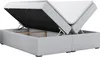 A white boxspring bed frame with the mattress lifted to reveal the storage compartment underneath. Produktbild-Vorschau