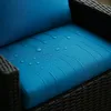 Close-up of a blue cushion with water droplets on it, part of an outdoor furniture set. Náhľad obrázku produktu