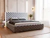 A tufted upholstered bed with pillows and a blanket in a well-lit bedroom setting. Produktbild-Vorschau