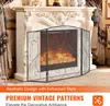 A fireplace screen in front of a fireplace, with text overlays describing the product. Voir les images du produit