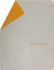 A folded blanket with one corner turned over, revealing a contrasting color underneath. Text is printed on the blanket. Produktbild-Vorschau