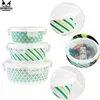 A collage of images showing a set of three glass food containers with lids, along with close-ups and a shot of one container filled with food. Produktbild-Vorschau