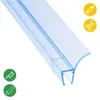 A close-up, angled view of a transparent shower door seal with blue accents, set against a white background. Icons indicating cutting tools are present in the corners. Náhled obrázku produktu