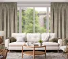 A living room scene with a sofa, coffee table, and curtains. Podgląd zdjęcia produktu