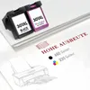 Two printer ink cartridges are shown on a stack of paper, with a sketch of a printer at the bottom. Produktbild-Vorschau