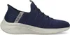 A side view of a blue Skechers slip-on shoe against a white background. Produktbild-Vorschau