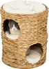 A cat tower made of woven material with two openings and a cushion on top. A cat is visible in one of the openings. Produktbild-Vorschau